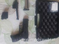 Walther P22 mit Laser und langen Ersatzlauf