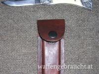 Klappmesser  mit weißem Griff und Holster