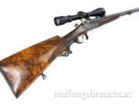 gebr. SODIA Hahnbüchsflinte Kal. 20/76 & 6,5x57 mit tiefgestochener Gravur und mont. Leupold 3-9x40 Abs. Plex, Zustand: Neuwerti