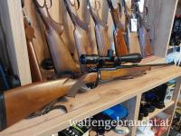 Mauser 98  243 Win. Meopta 6-18x50 LP